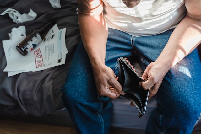 Man holding a leather wallet