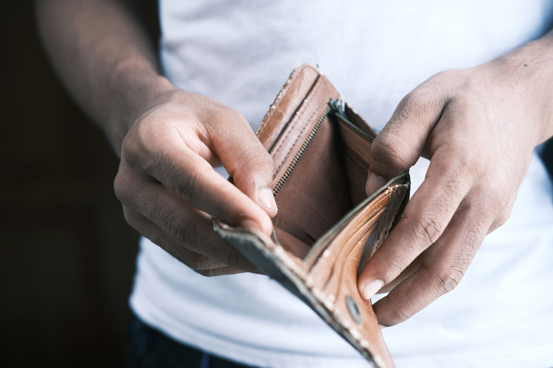 A man with an empty wallet.