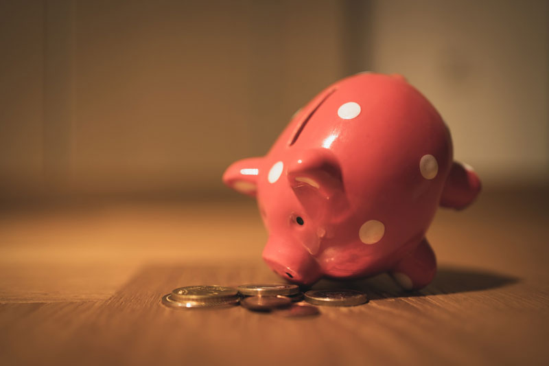 A piggy bank on the floor