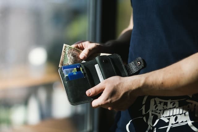 A man holding his wallet